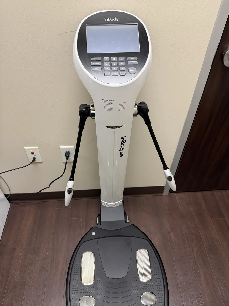 The InBody body composition analyzer standing in a room at the pharmacy.